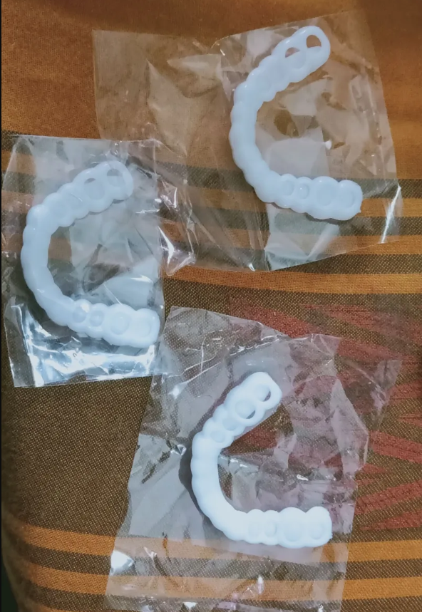 Smile Artificial Teeth